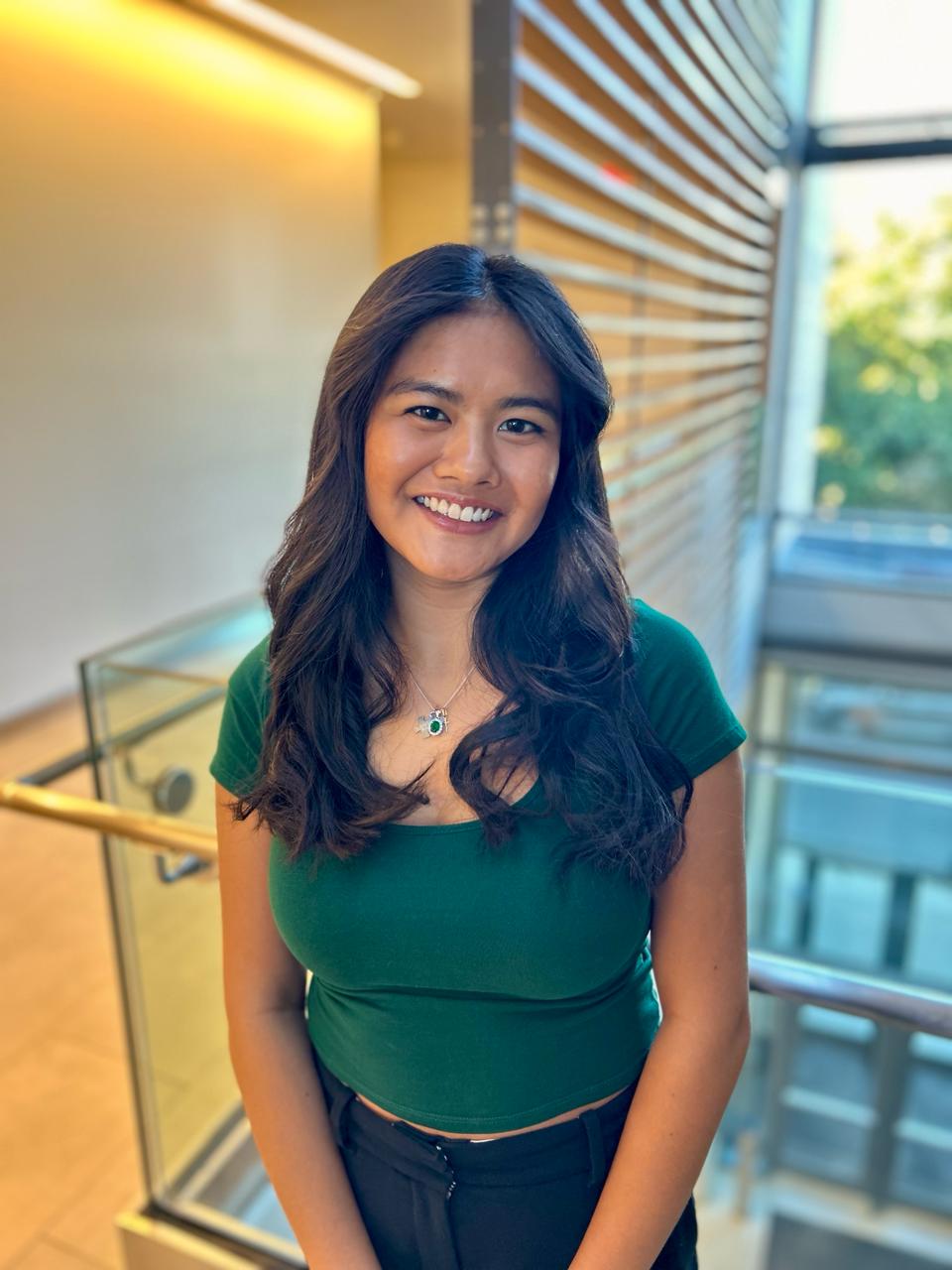 Portrait of Rose Lucina in an academic setting.