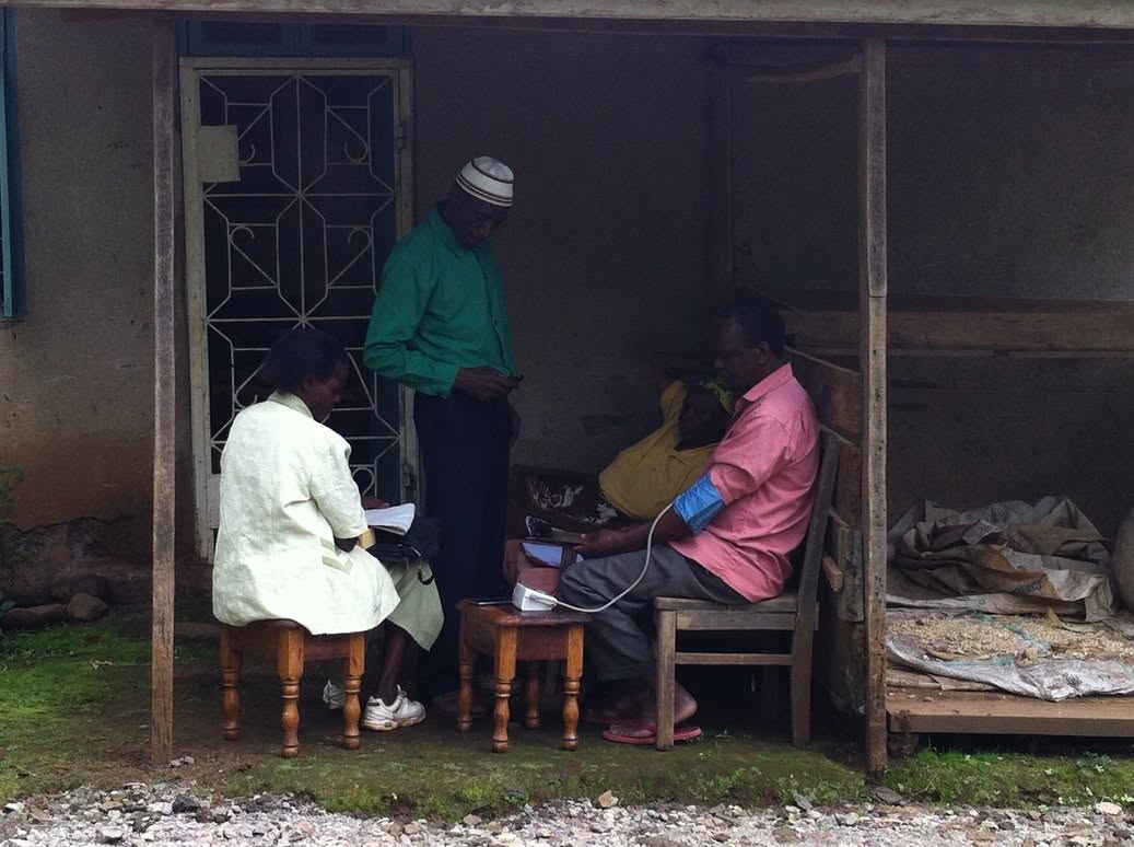 Dream Global team members during a community visit in Kisiki.